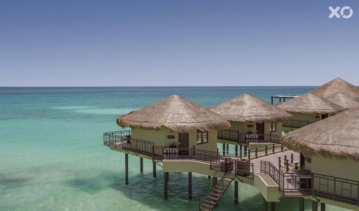 Palafitos overwater bungalows в El Dorado Maroma