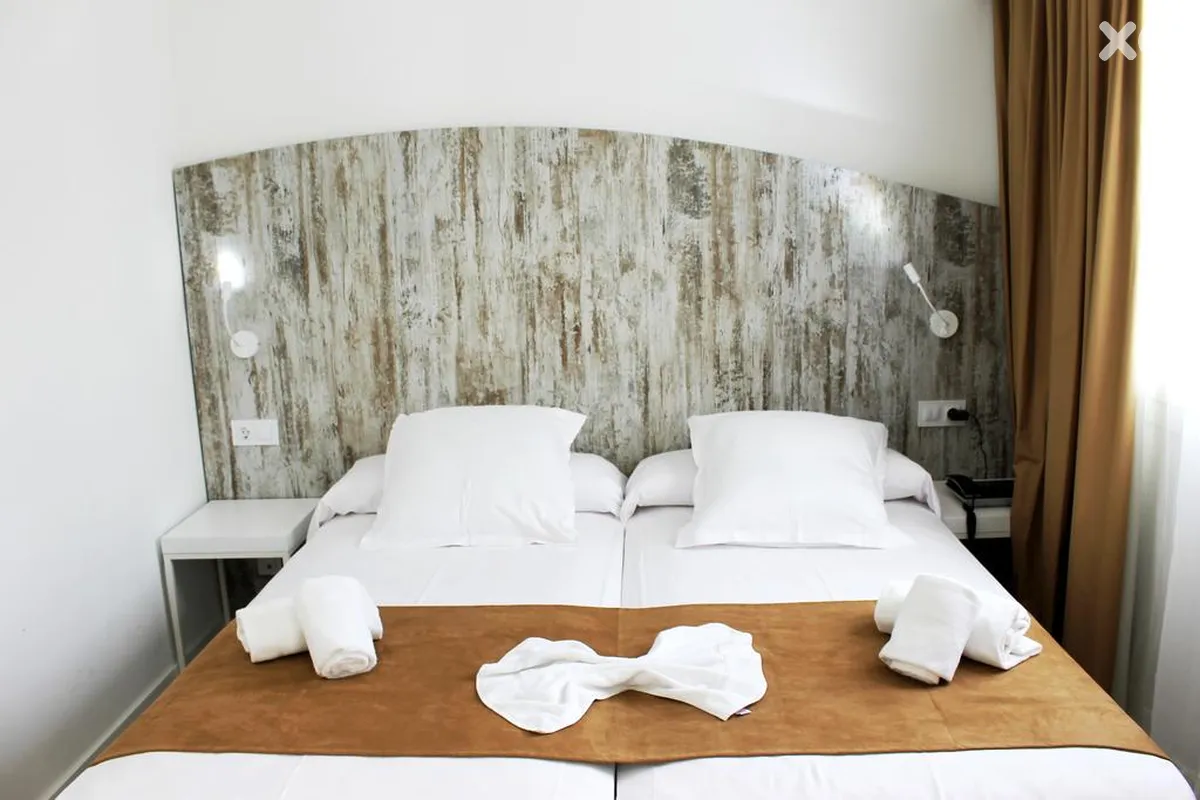 Triton Beach Hotel